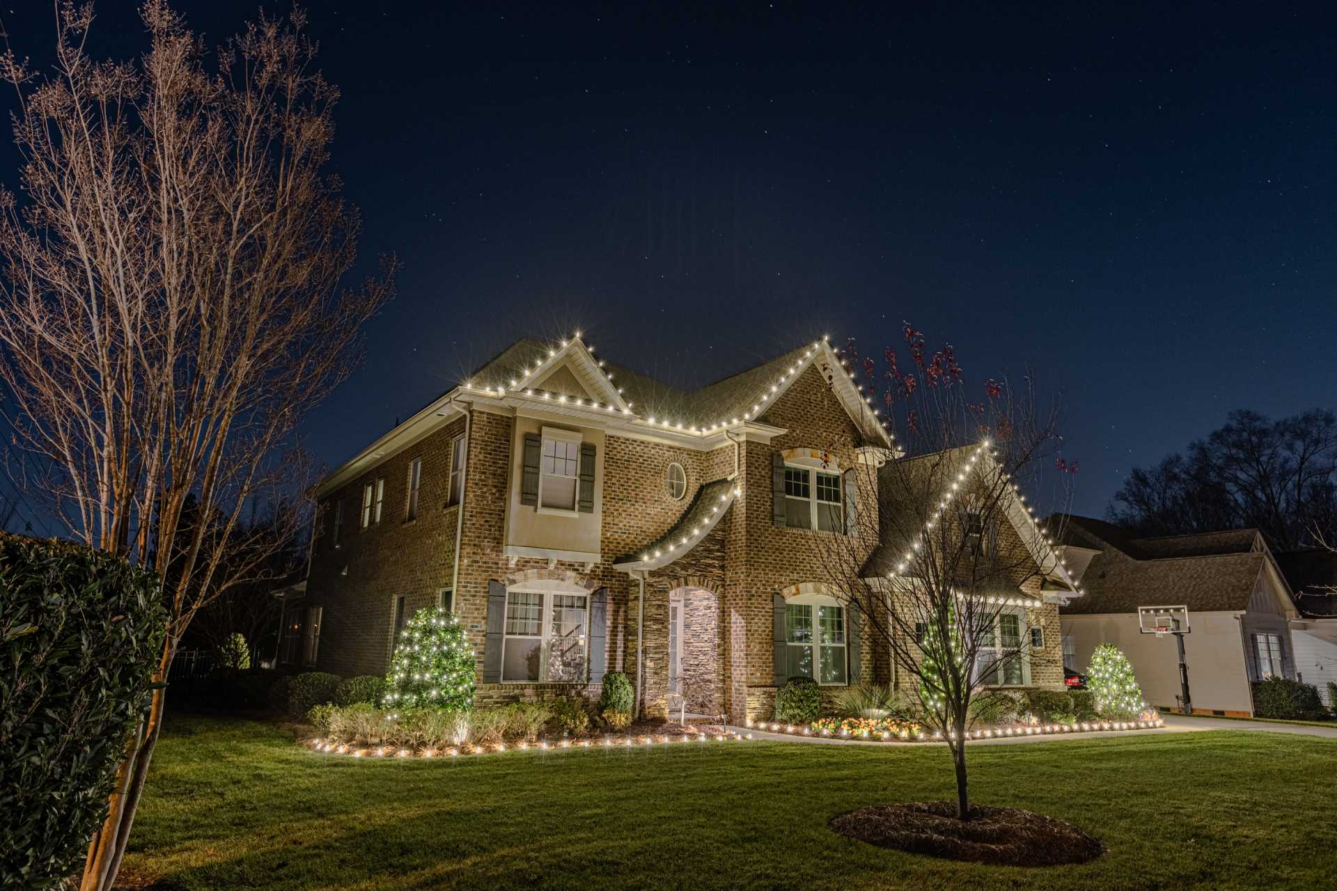 Christmas light takedown crew at a Lake Oconee home