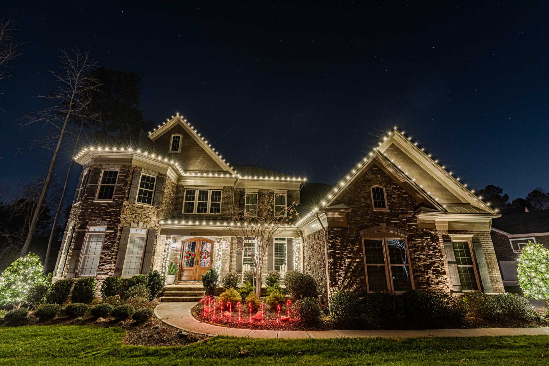 Commercial Christmas light installation on a Lake Oconee storefront